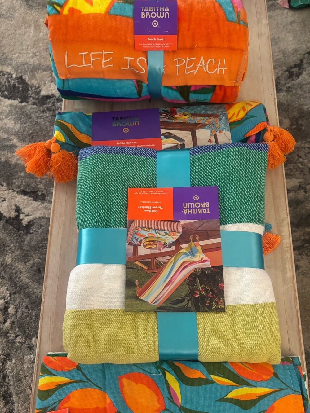 TabithaBrownCollection includes kitchen towels,outdoor throw, table runner,towel